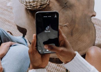 person holding black android smartphone