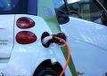 white and orange gasoline nozzle