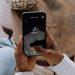 person holding black android smartphone
