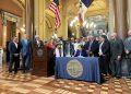Reynolds signs bill protecting ownership of Iowa farmland