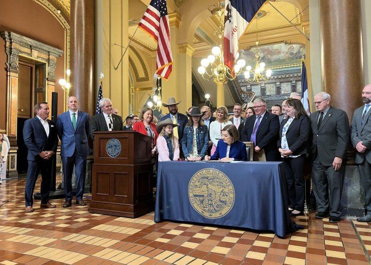 Reynolds signs bill protecting ownership of Iowa farmland